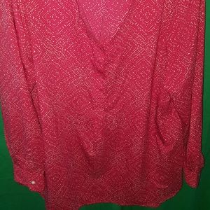 Pink and white patterned blouse